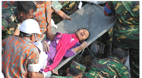 Miraculous as it may sound, a woman was rescued alive, almost unhurt, from inside the rubble of Rana Plaza Friday afternoon, the 17th day into the country